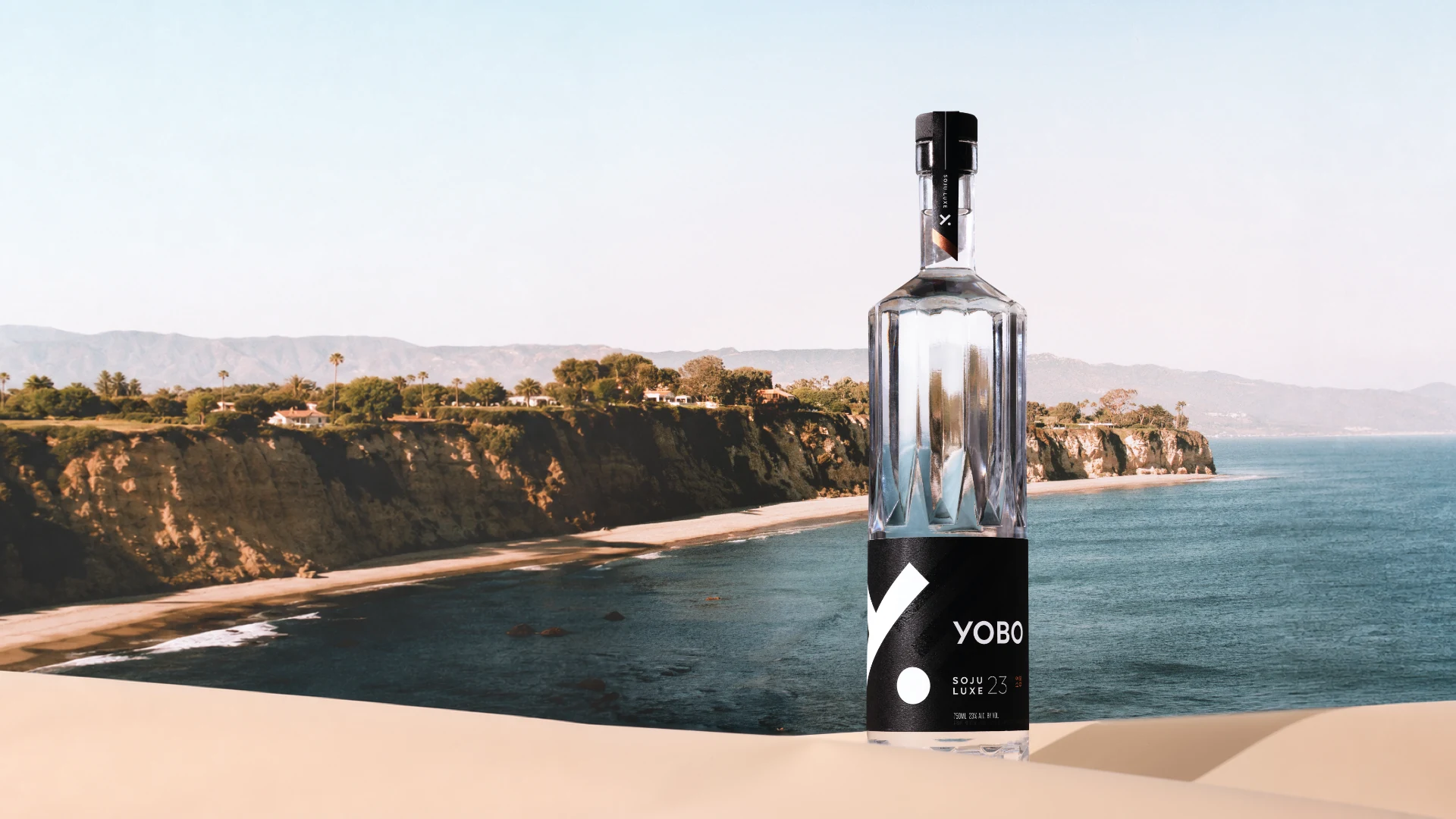 YOBO Luxe bottle overlooking a California cove